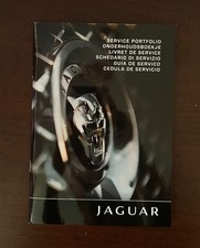 Jaguar service book stamped - service,