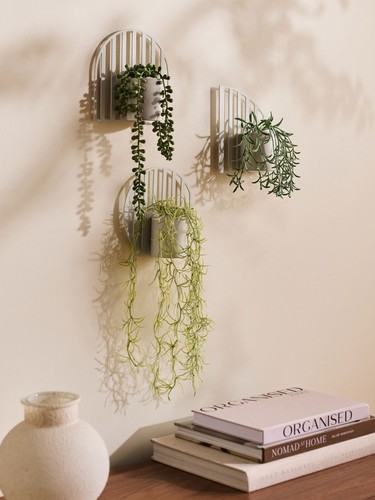 Next metal wall - next, mounted