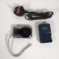 Canon Ixus 100 IS Digital Camera - Silver With Charger Tested Working