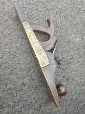 Early Woodworking Plane With A
