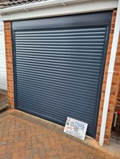 Electric roller garage door - roller,