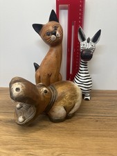 Hand carved wooden cat - hand, zebra