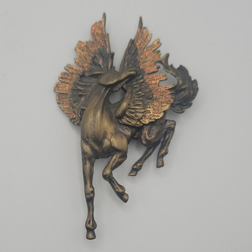 Bronze tone metal winged - jj,
