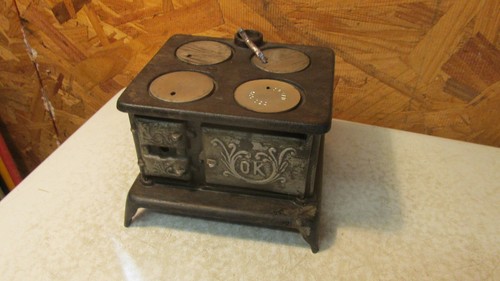Antique cast iron toy cook - antique,