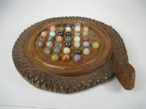 Hand carved wooden solitaire - hand,