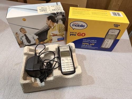 Noki 1100 mobile phone - noki,