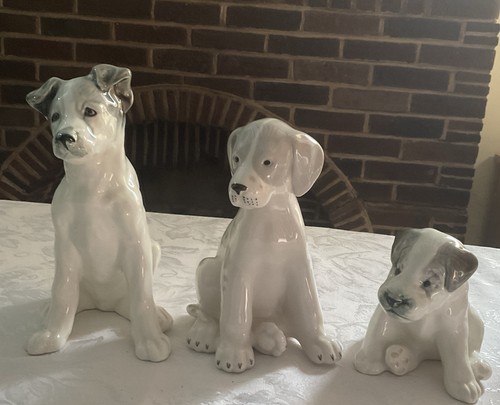Three russian puppy figurines - three,