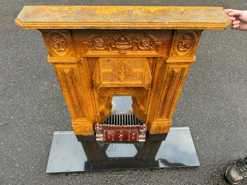 Cast iron fireplace with - ,
