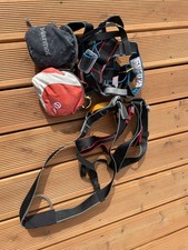 Climbing gear harnesses
