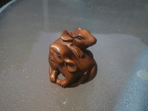 Hand carved wood - hand, mice