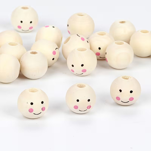 Wooden doll head beads - x,
