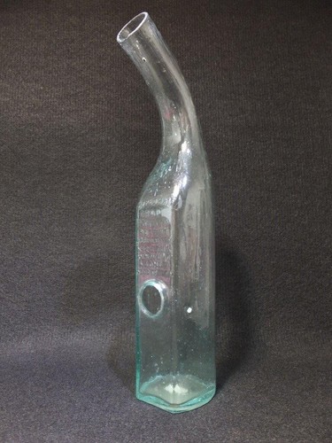 Antique grape feeding glass