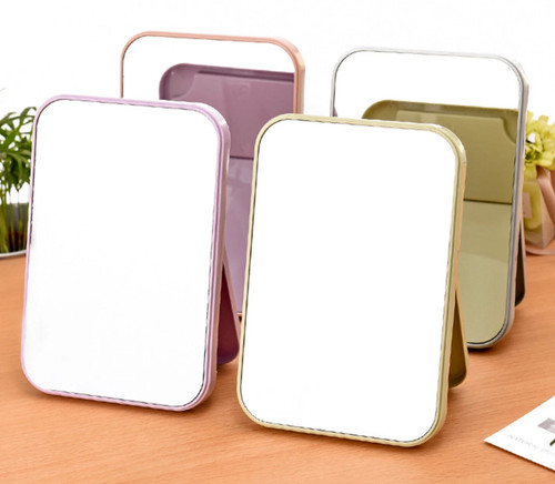 Square shape hand mirror held - hand,