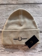 BRAND NEW GENUINE FRED PERRY GRAPHIC BEANIE, OYSTER, ONE SIZE.