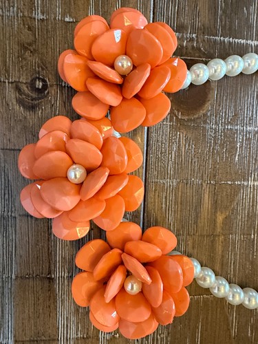 Bold orange bakelite floral - bold,