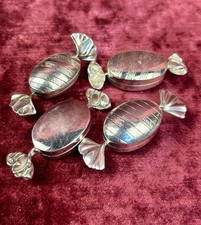 A Set Of Four Novelty Solid