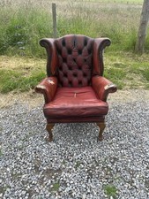 A Vintage Oxblood Leather Chesterfield Wing Back Armchair