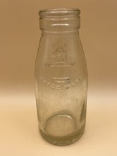 Antique childs glass milk bottle.