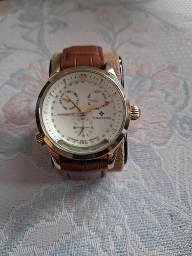 Theorema mens gold watch - ., day