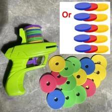 Foam disc shooting gun for kids, an interactive outdoor toy.