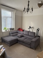 Used 3 Seater Gray Fabric Corner Sofa Bed with Storage space.