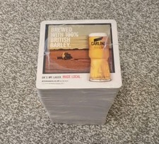 100 BRAND NEW CARLING LAGER BEER MATS