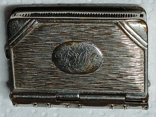 Book shaped seen silver - book,