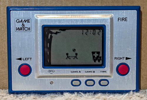 Nintendo game watch fire - &,