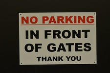 NO PARKING IN FRONT OF GATES