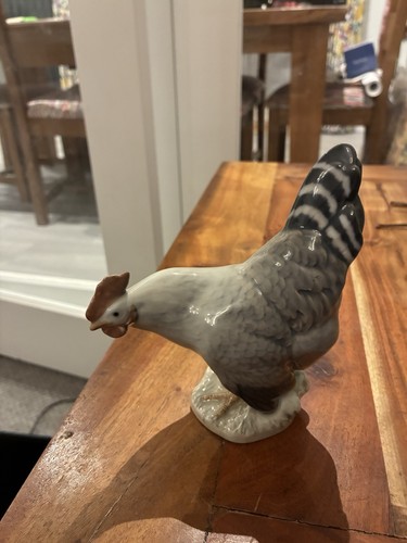 Royal copenhagen hen looking - copenhagen,