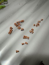 N gauge flower troughs (17), selection of chimnet tops, bag of figures(about 80)