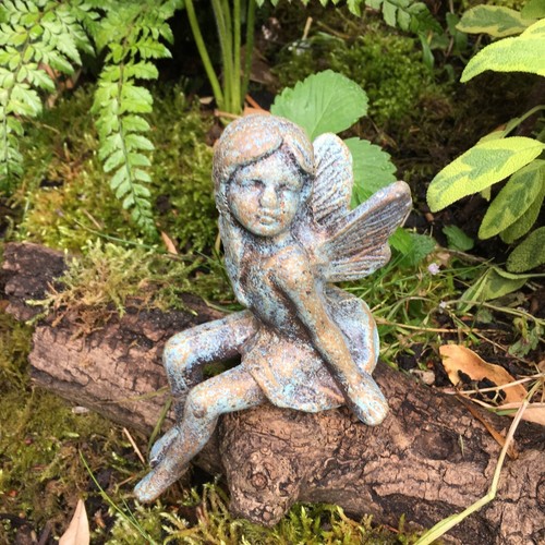Fairy sitting cast - fairy, iron