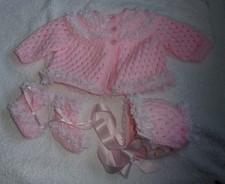 Hand knitted baby girl 3 piece pink matinee set with 7.31 metres of white lace