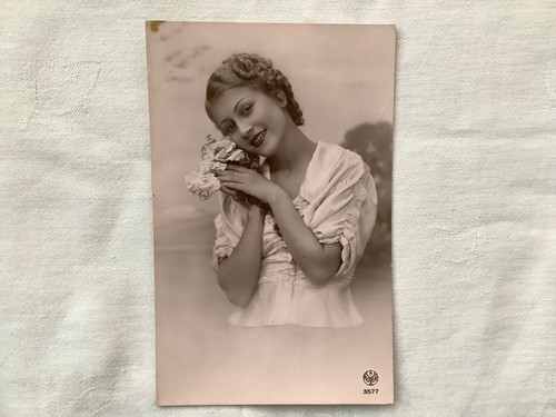Lady resting her cheek - , on