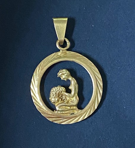 Heavy 14ct yellow gold girl