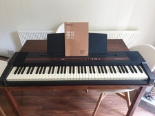 Roland EP-77 Digital Piano with Weighted Keys and Electric Features