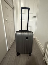 Tripp Hard Shell Suitcase Silver 4 Wheels Spinner TSA Lock Good Used Condition