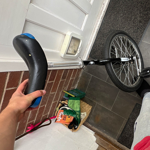 Unicycle with blue handle - with,