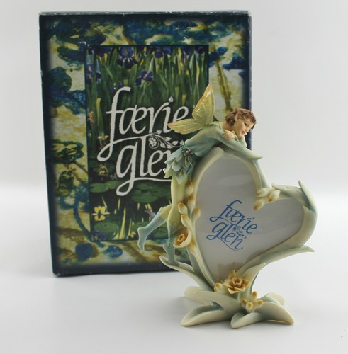 Faerie glen figurine looking - faerie,