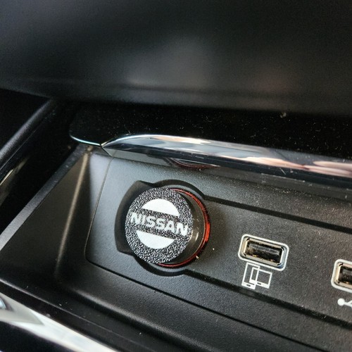Nissan cigarette lighter cover - cigarette,