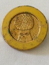 C.C.L.G.A. - Unidentified gold and yellow badge with wheatsheaf design