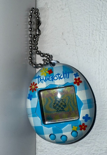 Tamagotchi virtual pet - pet, bandai