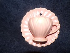 vintage pink tea cup wall