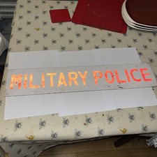 Military Police sign off a WW2