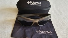 Polaroid flexible green frame polarized sunglasses. P7228. With case.