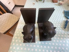 Antique ebony elephant bookend with ivory tusk