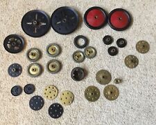 Vintage Meccano 1950s wheels, cogs and pulleys.