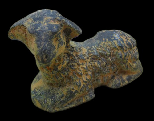 Old bronze recumbant ram - recumbant,