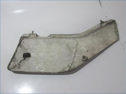 Fairing cover under left seat