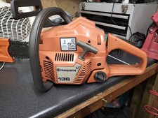 Husqvarna 136  14" Bar. Runs
